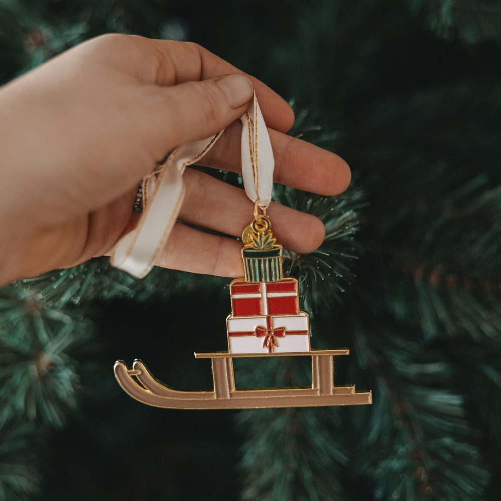 Eulenschnitt Baumschmuck „Schlitten“